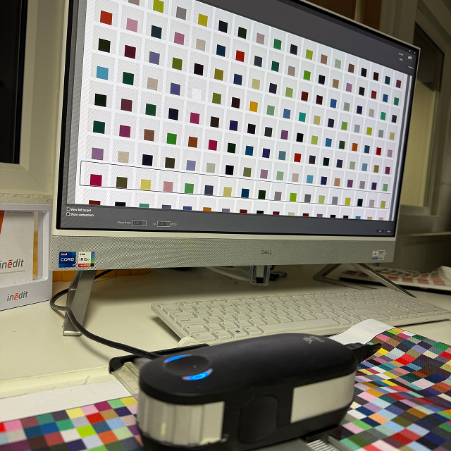 Fabrci colour swatches on a computer screen